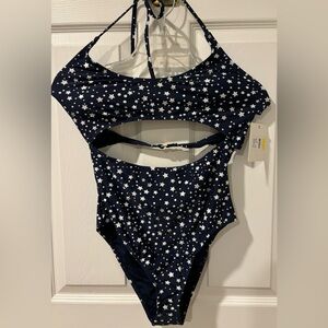 Navy blue one piece attached swimsuit with white stars.